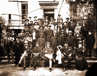 Representatives sitting on steps of Florida Capitol Building.