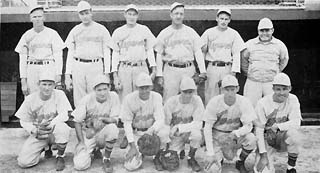 12 inmates in baseball uniforms.