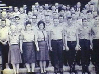 Group of male and female correctional officers.