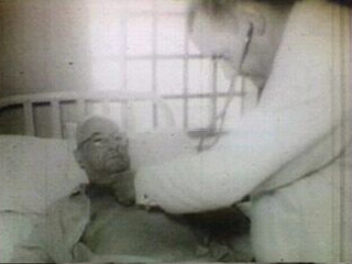 Doctor attending a man.