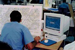 Man Sitting at a computer