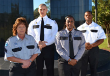 Four officers wearing new (white) uniforms.