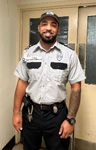 Officer wearing new uniform.